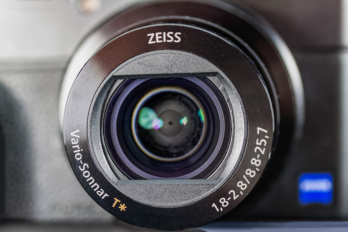 Close up of Zeiss lens, key factor in the fujifilm vs sony debate