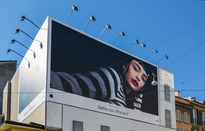 A giant Iphone X billboard display in Milan, Italy