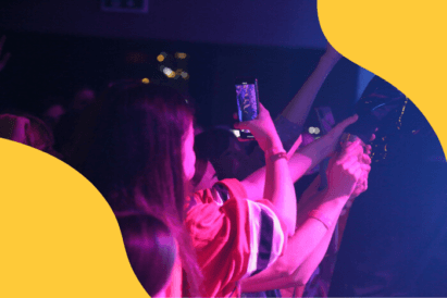 Mobile phone taking video at a concert