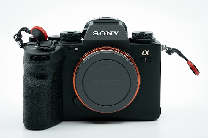 Sony a1 camera body against a white background