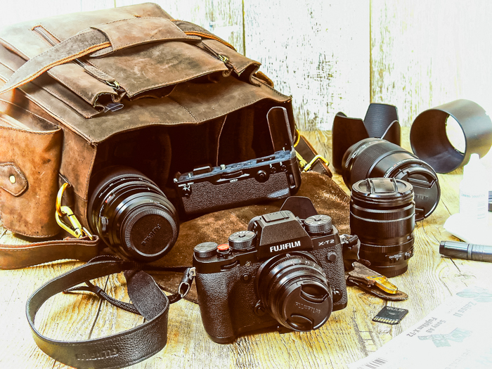 Fuji camera with lenses in vintage camera bag