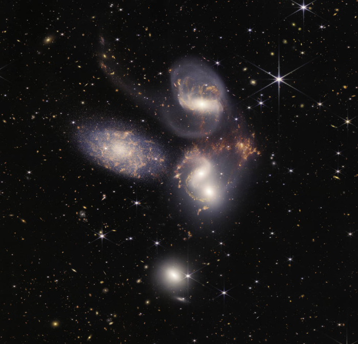 An image from the NASA James Webb telescope showing the Stephens Quintet galaxies