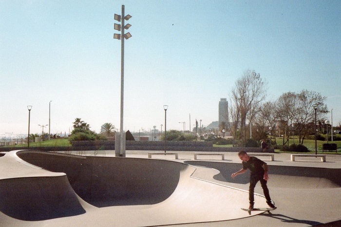 Single skateboarder in Mar Bella skate park in Barcelona