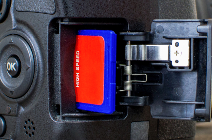 A DSLR memory card slot close-up