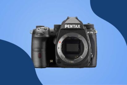 Best DSLR Camera with Touch Screen (Pentax K-3 Mark III) on a colored background