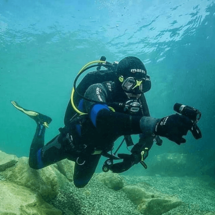 An underwater portrait of a diver