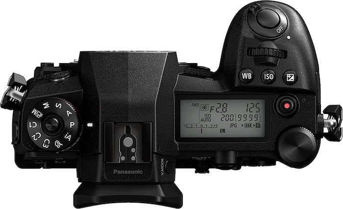 Top view of a Panasonic DC-G9 showing its LCD, mode dial, hot shoe and other control buttons