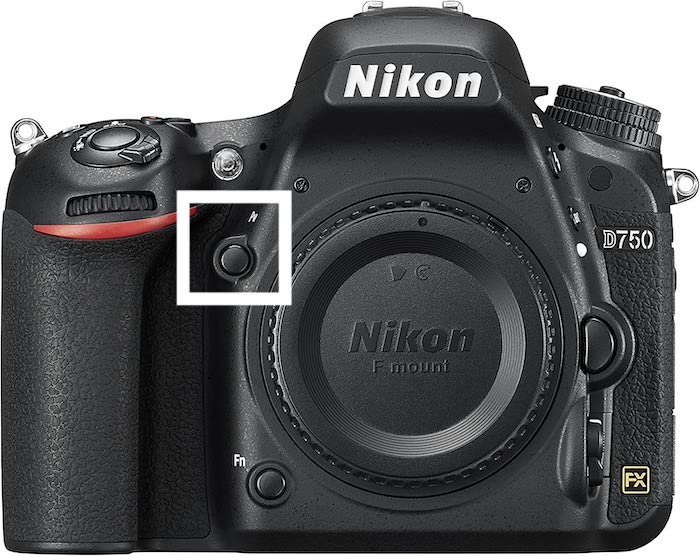 Product image of a Nikon D750 DLSR camera with the preview button highlighted