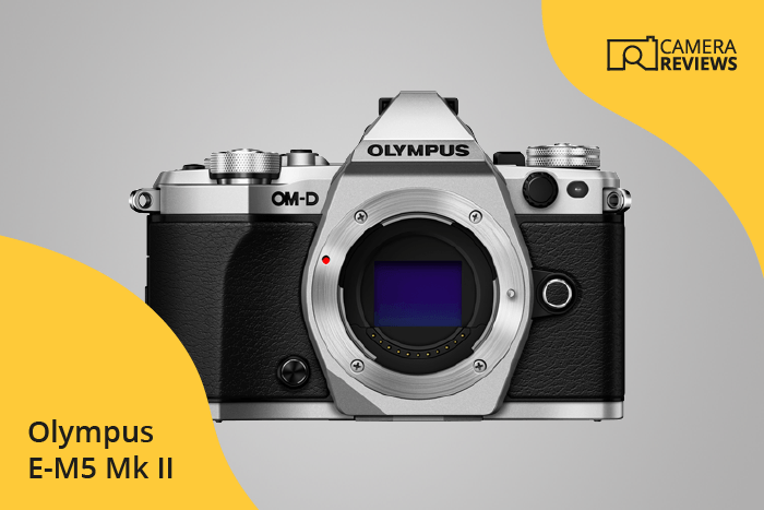 Olympus OM-D E-M5 Mark II photographed on a colored background