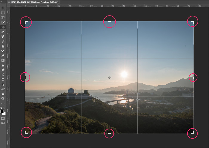 A screenshot of how to crop a picture in Photoshop highlighting corner and side handles