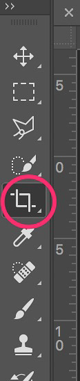 A close-up of the Crop tool highlighted in Photoshop's side toolbar